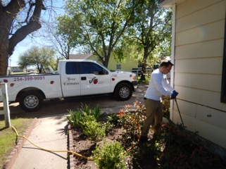 employee from Jones Ladybug completing a job